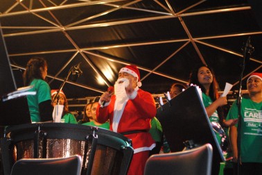 Santa sings.