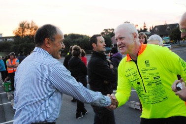 The Governor-General speaks with cyclists.