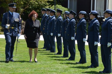 Image of the High Commissioner of Cyprus, HE Mrs Martha Mavrommati inspects the Guard of Honour