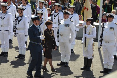 an image of Dame Patsy inspecting the Guard of Honour