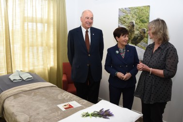 Image of Dame Patsy and Sir David inspecting the treatment rooms