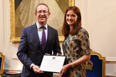 Image of Minister of Justice, Andrew Little presenting Rosa Polaschek with the Cleary Memorial Prize