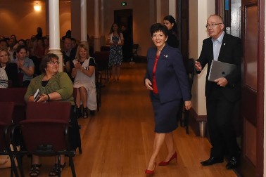 Image of Dame Patsy arriving at Auckland Town Hall escorted by Auckland Council Chief Executive, Stephen Towne