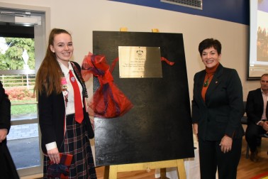 Dame Patsy unveiling the plaque to mark the official opening