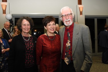 an image of Dame Patsy with Michael Perry, a descendant of the founder, Michael Wilding, and Jenny Perry