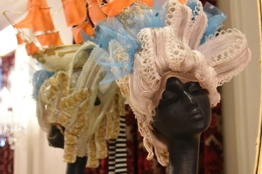 Image of a large wig complete with galleon on top