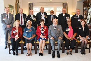 Images of recipients and representatives following the MID ceremony