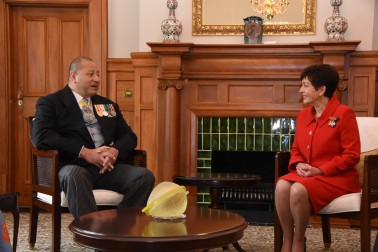 Image of Dame Patsy and King Tupou VI chatting in the Liverpool Room