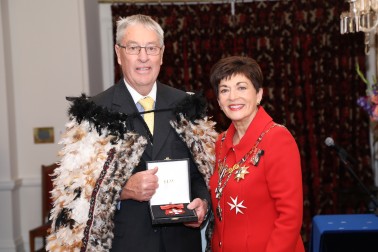 Image of David Salter collecting the insignia of a MNZM on behalf of the late Mrs Georgina Salter,of Oamaru, MNZM, for services to netball