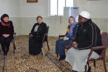 The imam of the Linwood Islamic Centre speaking to Dame Patsy