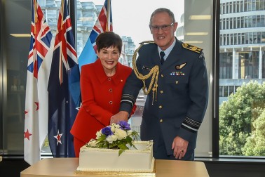 Dame Patsy cuts the cake with Chief of Defence, Air Marshall Kevin Short