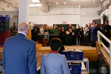 Image of Dame Patsy and Sir David listening to a waiata from the ACM team 