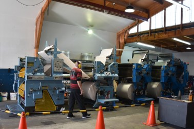 Image of the printing press being started