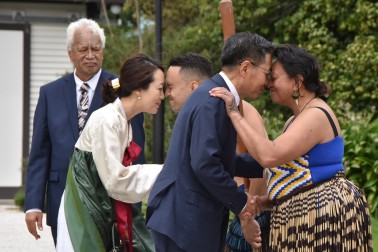 HE Mr Sang-jin Lee and Mrs Youngmi Choi greeted with a hongi