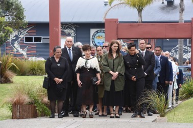 The official party arriving at the entrance to Mataatua Marae