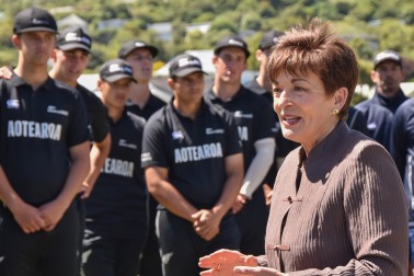 Dame Patsy speaks to the cricketers