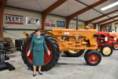 Dame Patsy and a tractor at Transport World