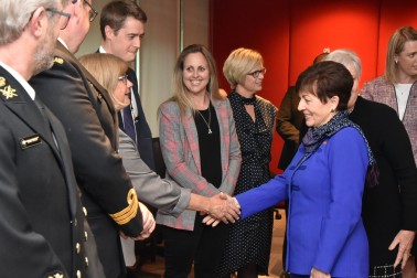 Image of Dame Patsy meeting staff at the New Zealand High Commission