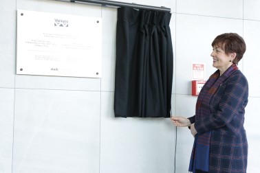 Dame Patsy unveiling the plaque at the Waikato Regional Council's premises