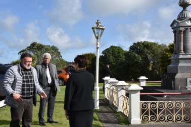 Dame Patsy Reddy by the grave of Te Whiti-o-Rongomai