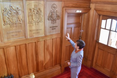 Dame Patsy speaking about the elements of her Coat of Arms