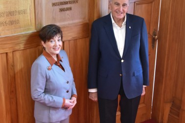 Dame Patsy Reddy and Sir David Gascoigne with the Coat of Arms
