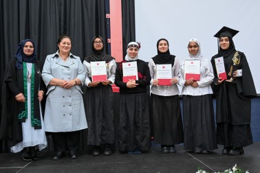 Dame Cindy Kiro with students from Zayed College