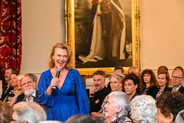 Ali Harper performs for the gathered guests
