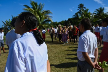 Students from Araura College form a guard of honour for Their Excellencies