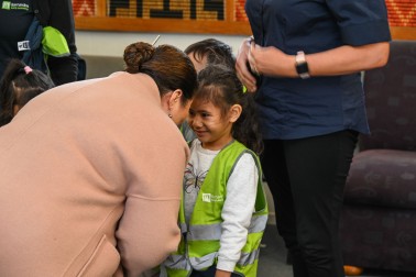 Dame Cindy meeting one of the children from Barnardos