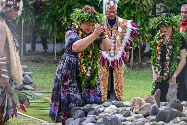 Dame Cindy placing the mauri stone at the pito of the marae