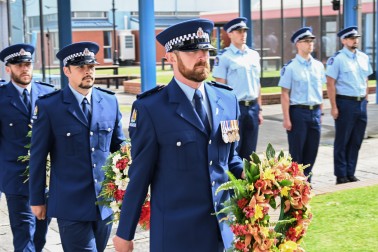 The wreaths carried out to the Memorial Wall