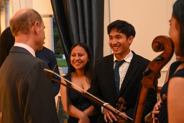 HRH the Duke of Edinburgh in conversation with members of Virtuoso Strings