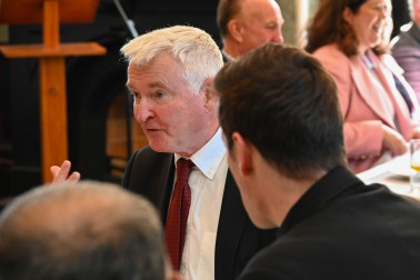 Dr Davies in conversation during the luncheon