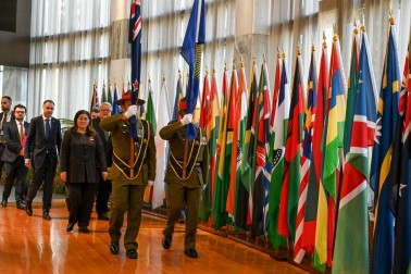 NZDF flag bearers lead the official party into the Banquet Hall