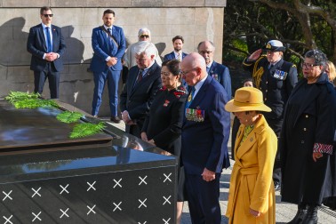 Their Excellencies stand in reflection in front of the Tomb of the Unknown Warrior