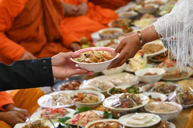 Food being shared following the opening blessing