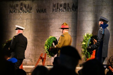 The wreaths carried by representatives from each service of the NZDF