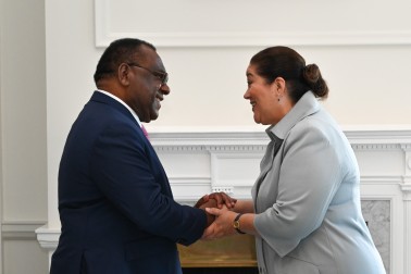 HE Mr Sakias Tameo, High Commissioner of the Independent State of Papua New Guinea greeting Dame Cindy