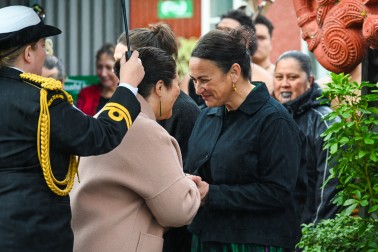 Dame Cindy is greeted following the pōwhiri