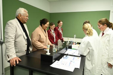 Dame Cindy and Government House kaumātua Joe Harawira with Woodford House students in the science lab