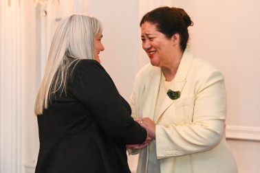 Dame Cindy congratulating recipient Andrea Neil