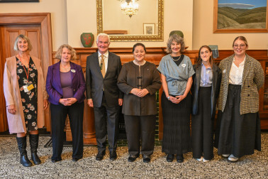 Dame Cindy and Dr Davies with the official party