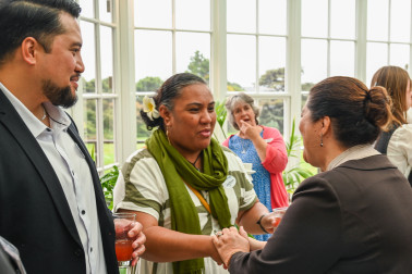 Dame Cindy meeting a guest at the reception