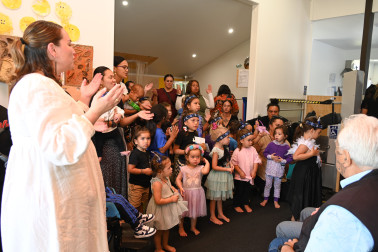Clara Aperahama-Kopa leading the tamariki in waiata at Te Puna Reo o Manga Tangaroa