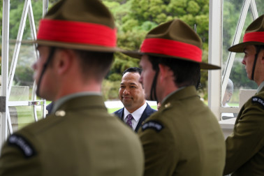 HE Mr Junior Aini walks through the Guard of Honour