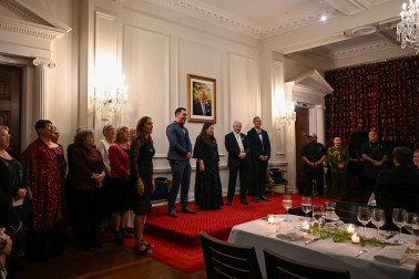 Their Excellencies, Government House Staff and Mayor Moko Te Pania sing a waiata