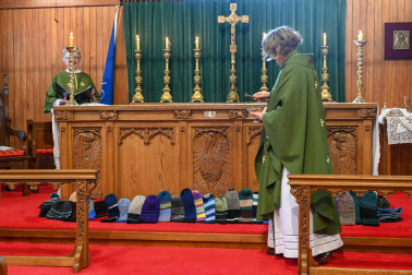 Reverend Cath Growcott blesses the beanies