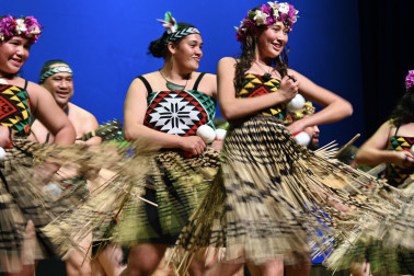 Members of a visiting kapa haka group perform