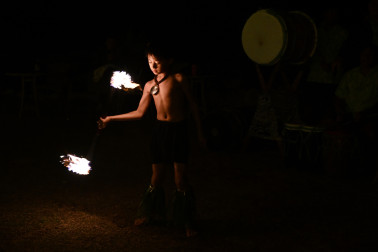 A young fire dancer